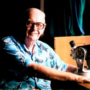 Arthur C. Clarke later in life with his Questar telescope still at his side