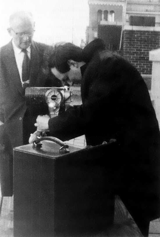 Stanley Kubrick looking through a Questar telescope