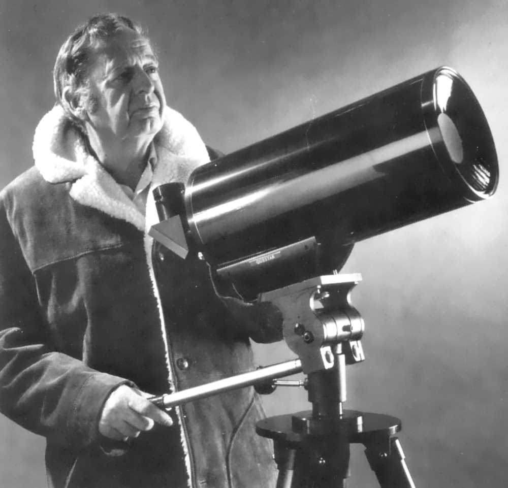 Douglas Knight posing next to a Wide-Sky Questar 7